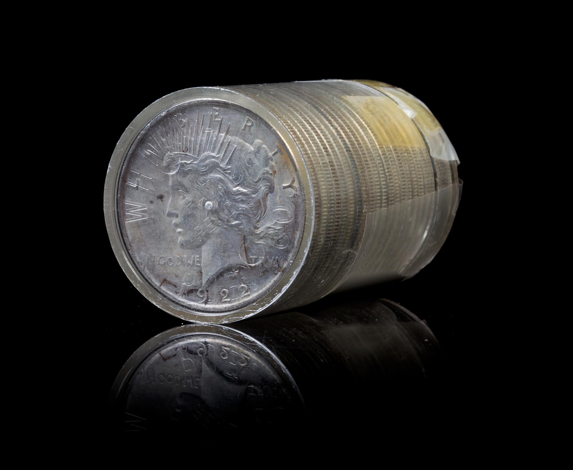 A Group of Twenty-Five United States 1922 Peace Silver Dollars
