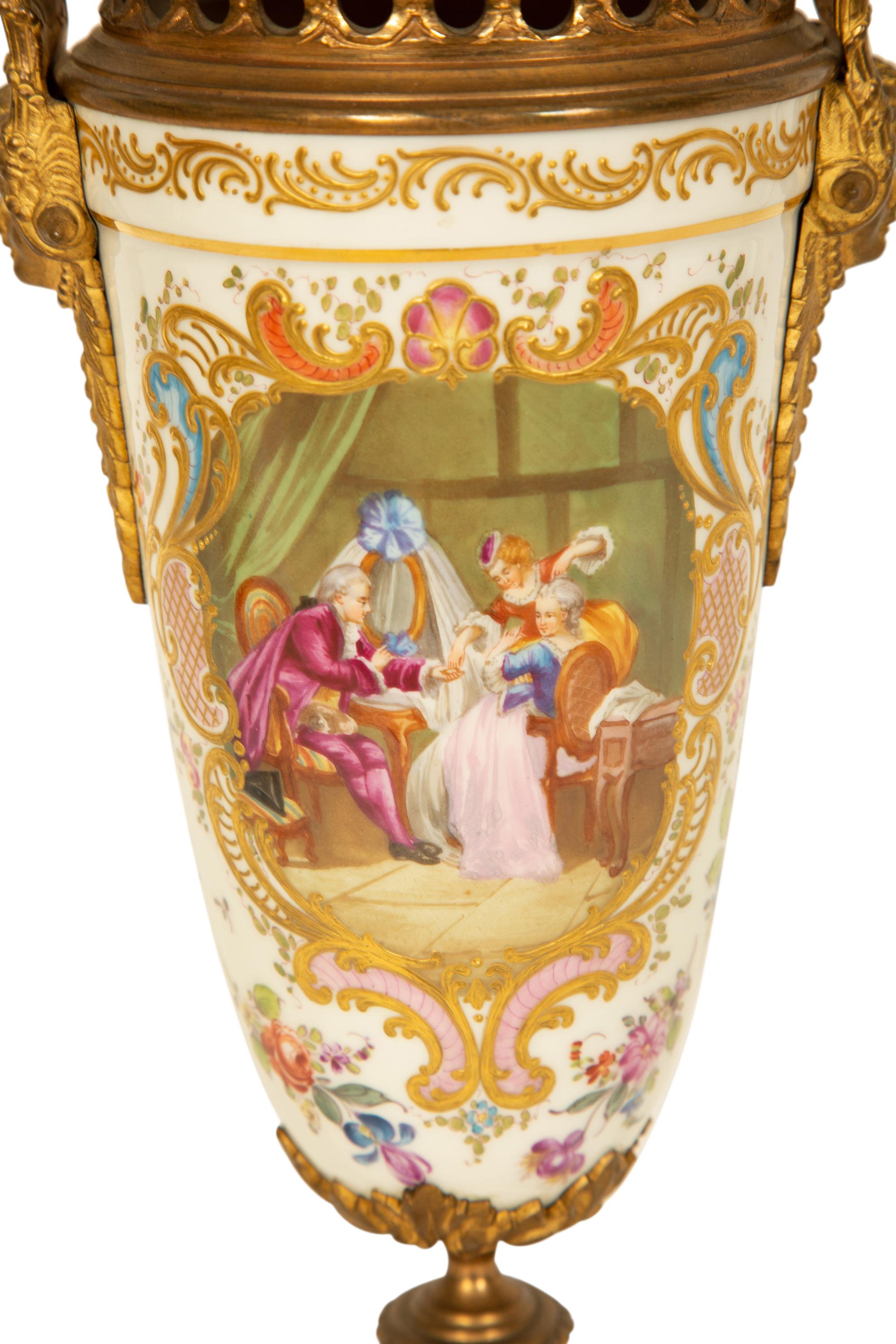 A Sevres Style Gilt Metal Mounted Porcelain Urn
