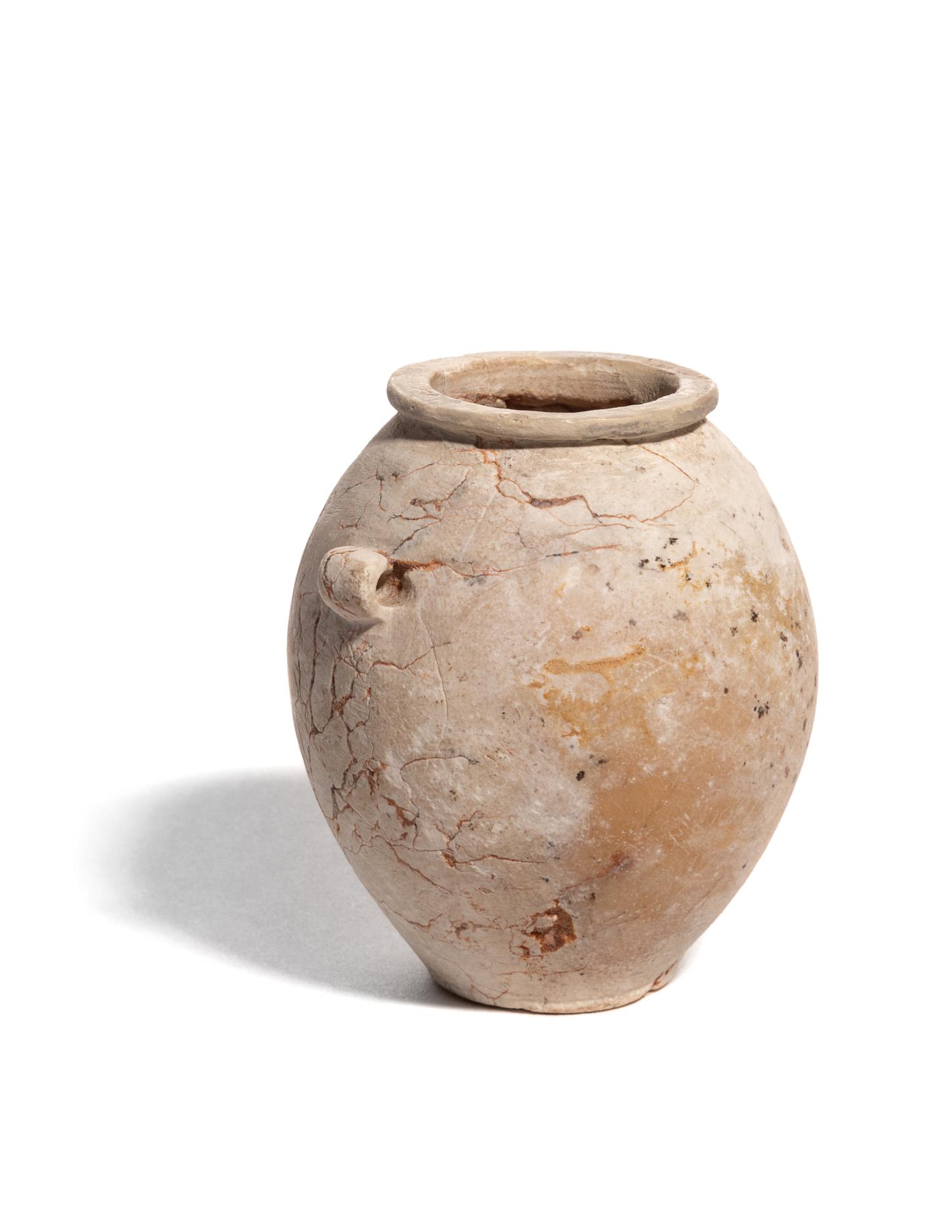 An Egyptian Miniature Limestone Lug Handled Jar