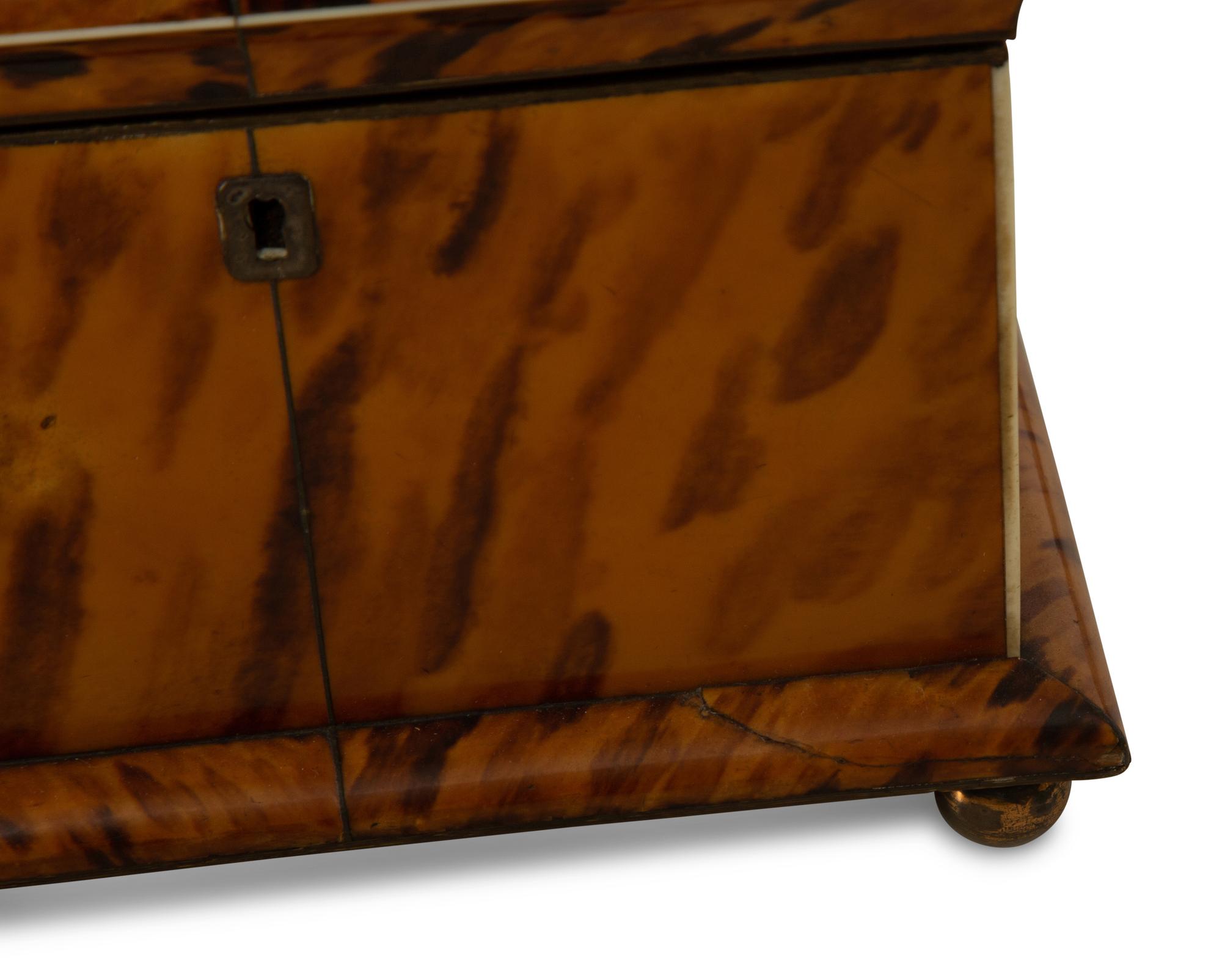 A Regency Tortoise Shell Veneered Tea Caddy