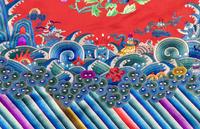 A Red Ground Embroidered Silk Lady's Informal Robe
