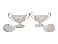 A Pair of Silver-Plate Sauce Tureens and Two Silver-Plate Warmers