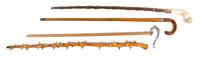 A Collection of Three Canes, Height of tallest overall 36 1/4 inches.