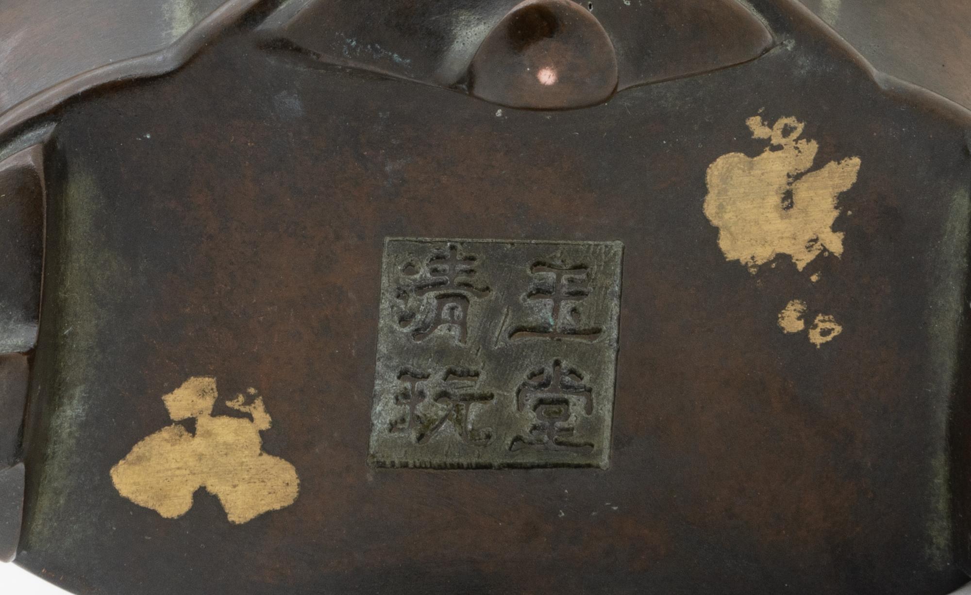 A Gold-Splashed Flori-Form Bronze Incense Burner