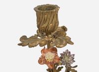 A gilt-bronze mounted Chinese figural porcelain three-light candelabra, the figure 18th century, the gilt bronze 19th century