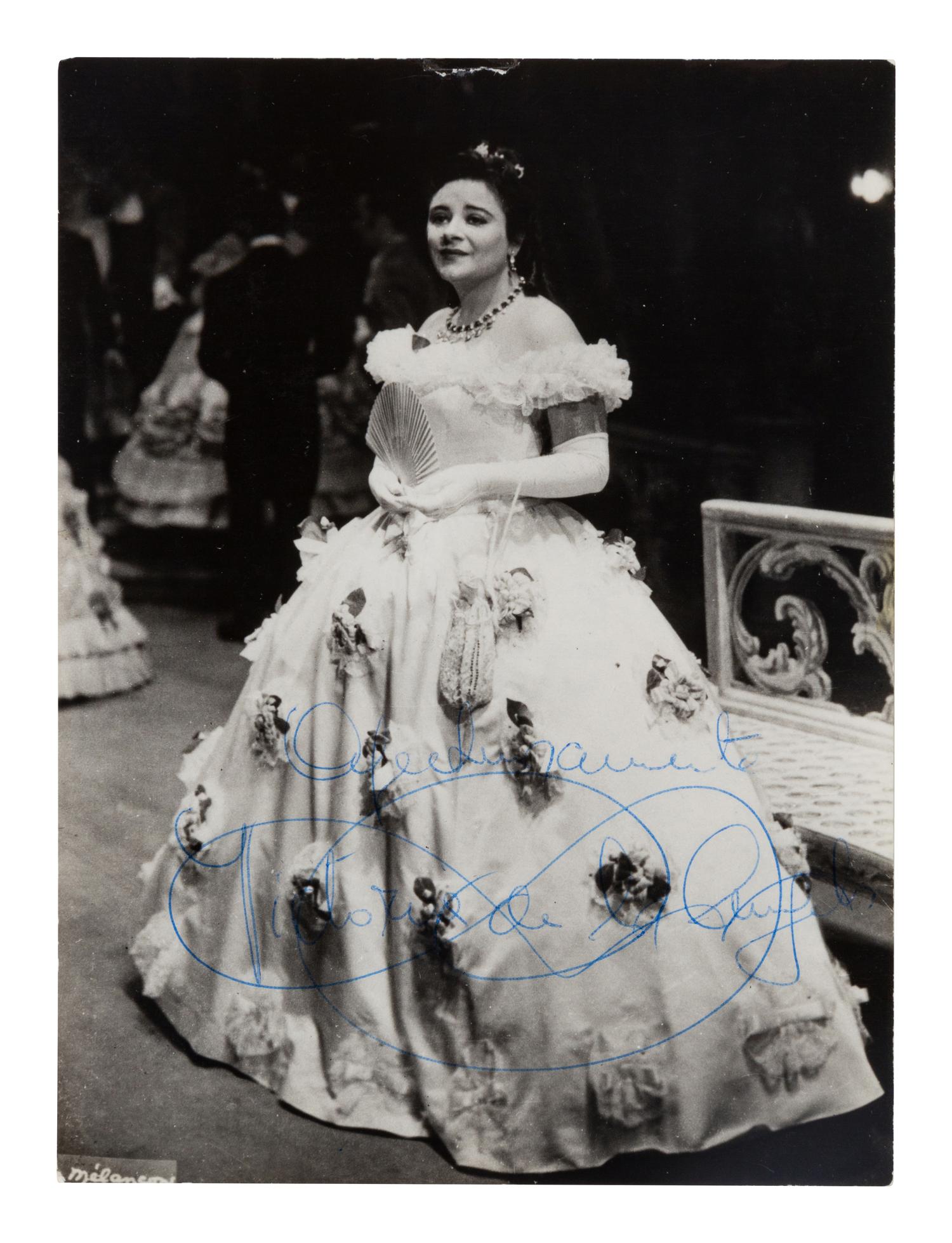 [20TH-CENTURY OPERA SINGERS]. A group of 6 signed photographs or photographic postcards of opera singers from the 1950s-1960s, comprising images of: