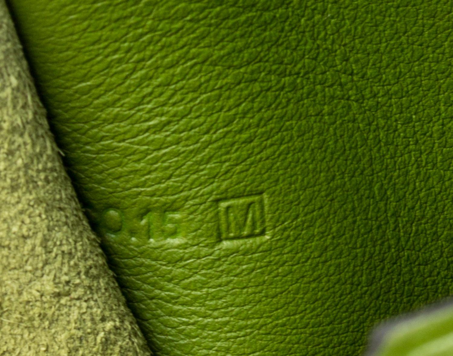 An Hermes Vert Anis Leather Passport Pouch, 7" x 8" x 1".