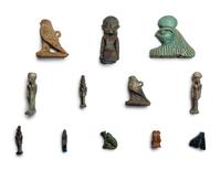 Twelve Egyptian Faience and Stone Horus Amulets