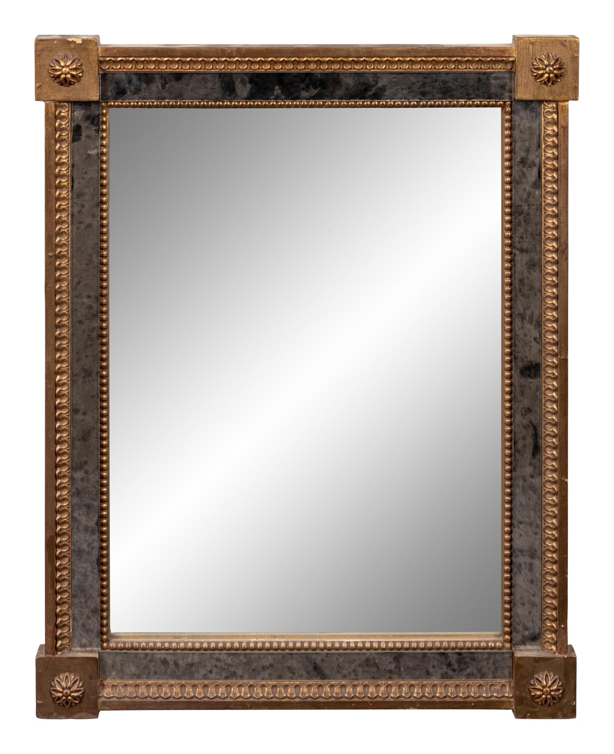 A Continental Faux Marble and Parcel Gilt Mirror