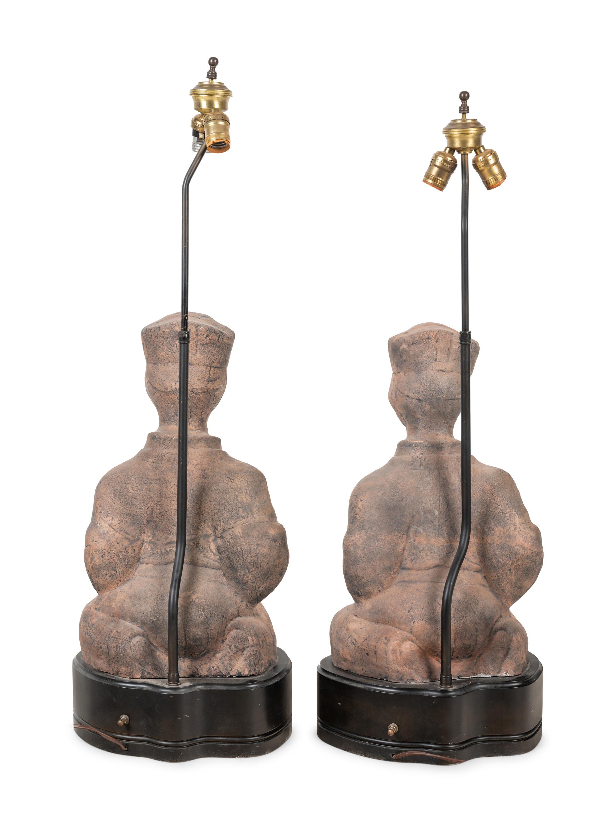 A Pair of Chinese Terra Cotta Figural Lamps