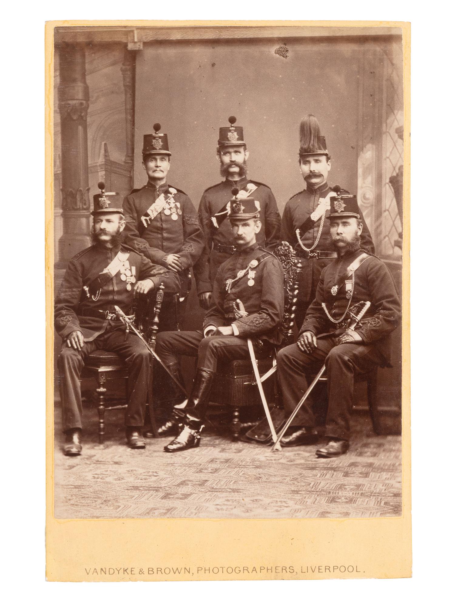 [EARLY PHOTO] English album presented to Capt. Bradley cont. 140+ photos, incl. military subjects.