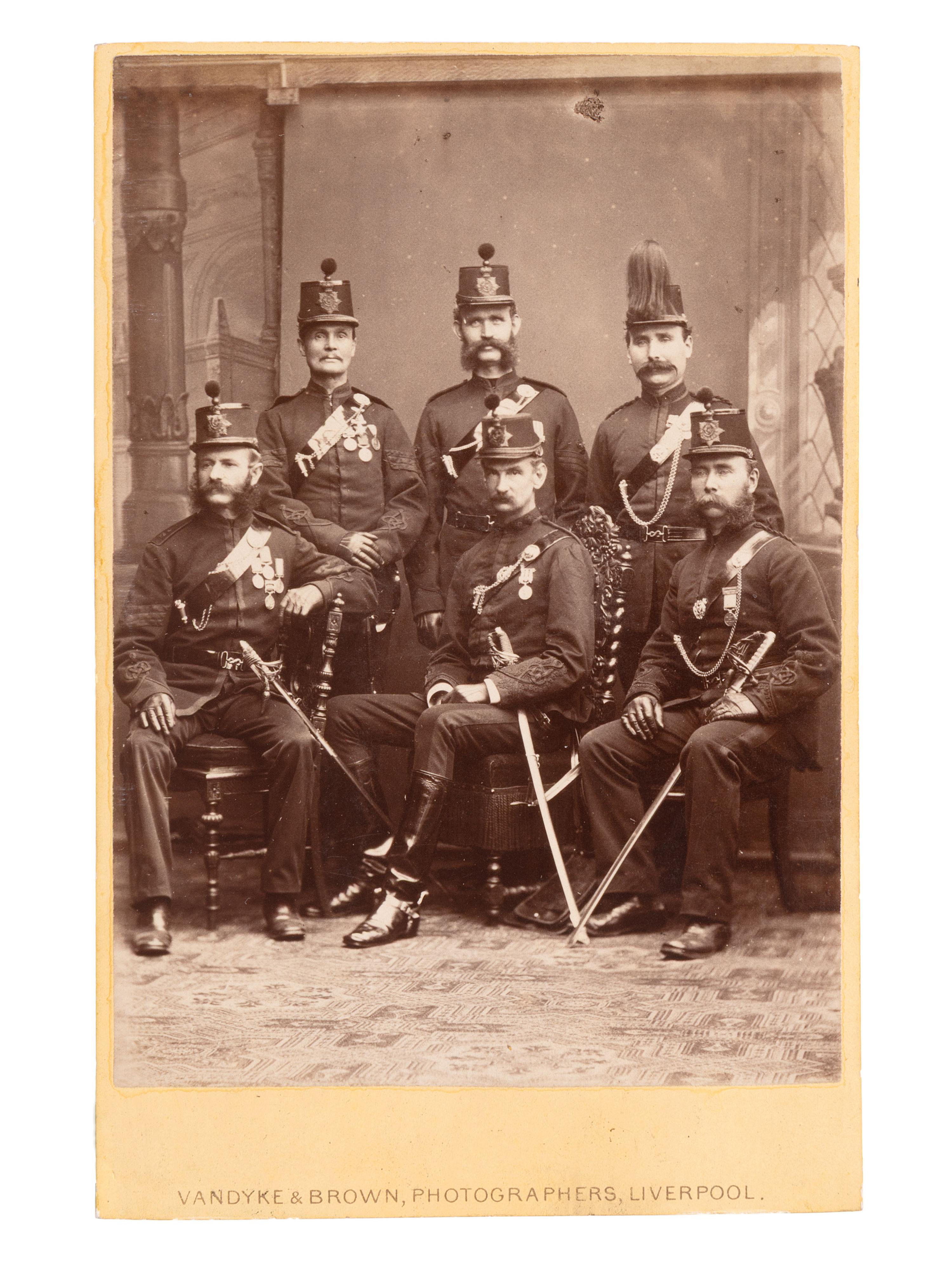 [EARLY PHOTO] English album presented to Capt. Bradley cont. 140+ photos, incl. military subjects.