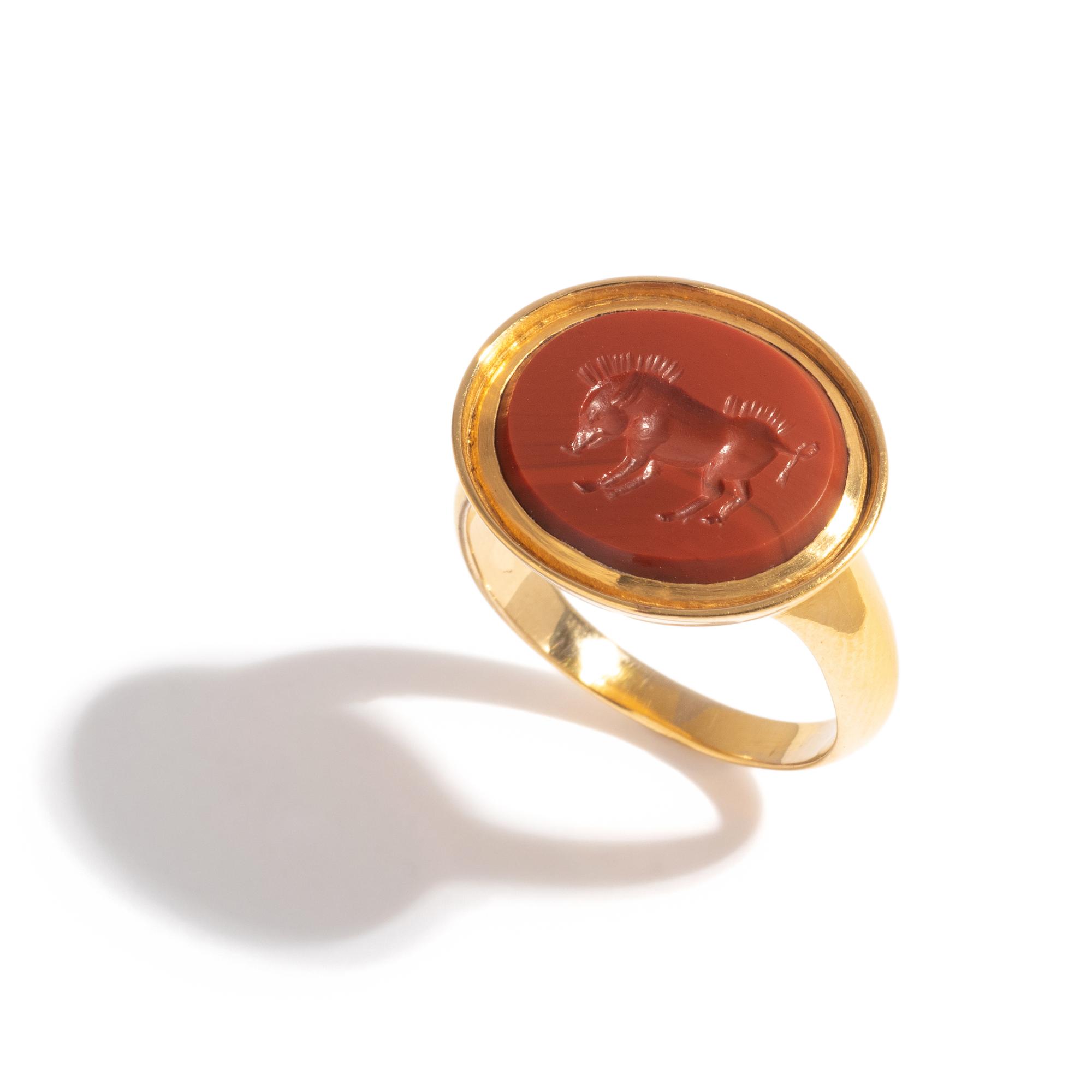 A Roman Red Jasper Ring Stone with a Boar — Set in a gold ring