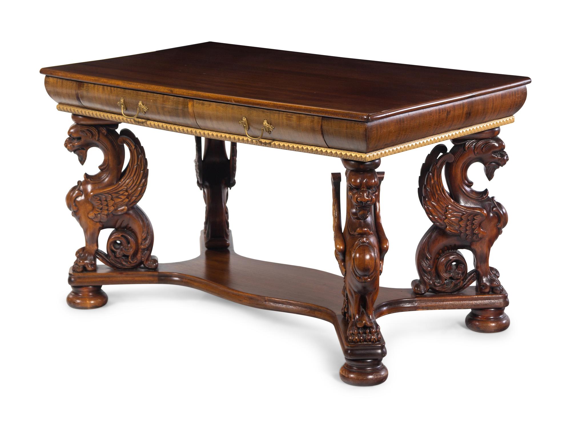 A Renaissance Revival Carved Walnut Library Table