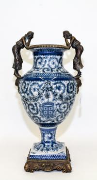 A Gilt Metal Mounted Blue and White Porcelain Vase. Height 19 inches.