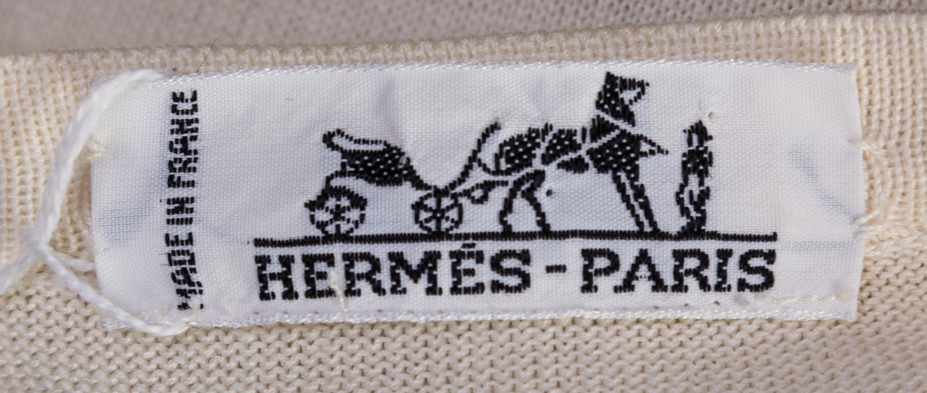 An Hermes Cream Cardigan Sweater, Size 40.
