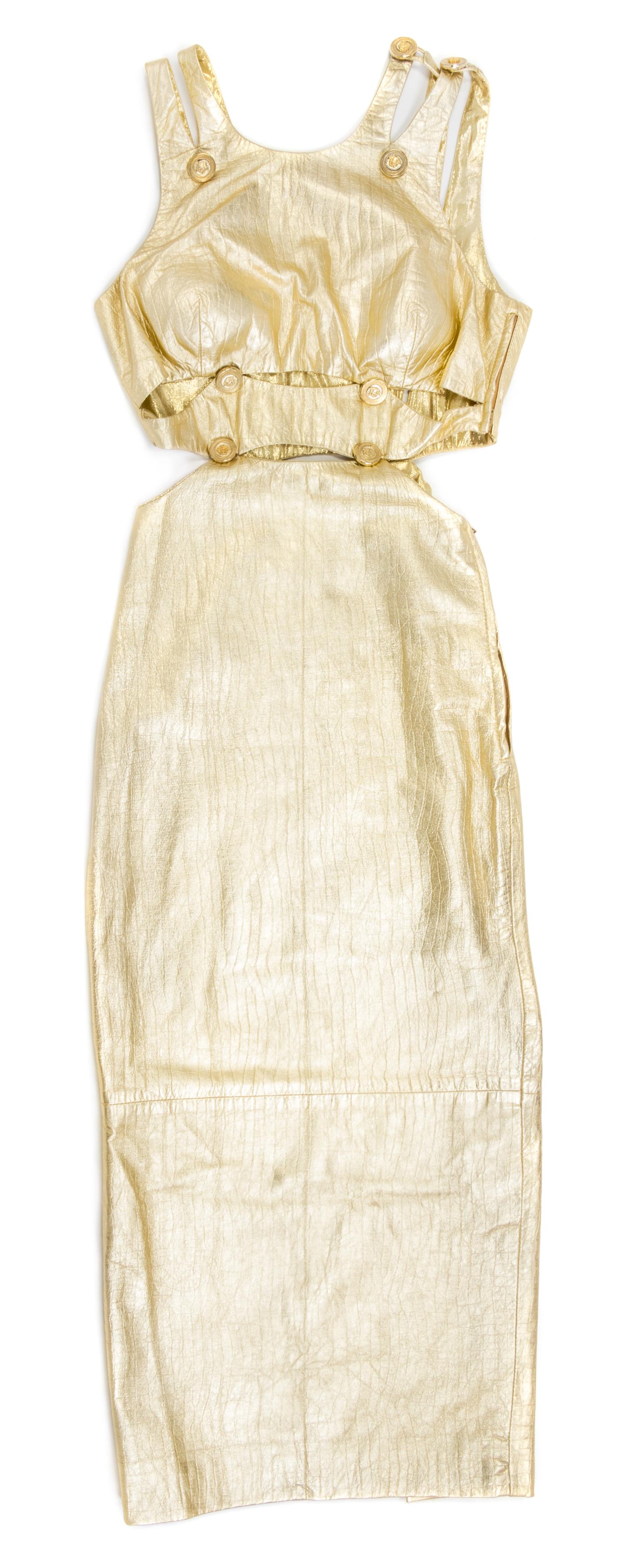 A Gianni Versace Gold Leather Cut Out Gown,
