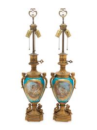 A Pair of Sèvres Style Gilt Bronze Mounted "Jeweled" Porcelain Fluid Lamps