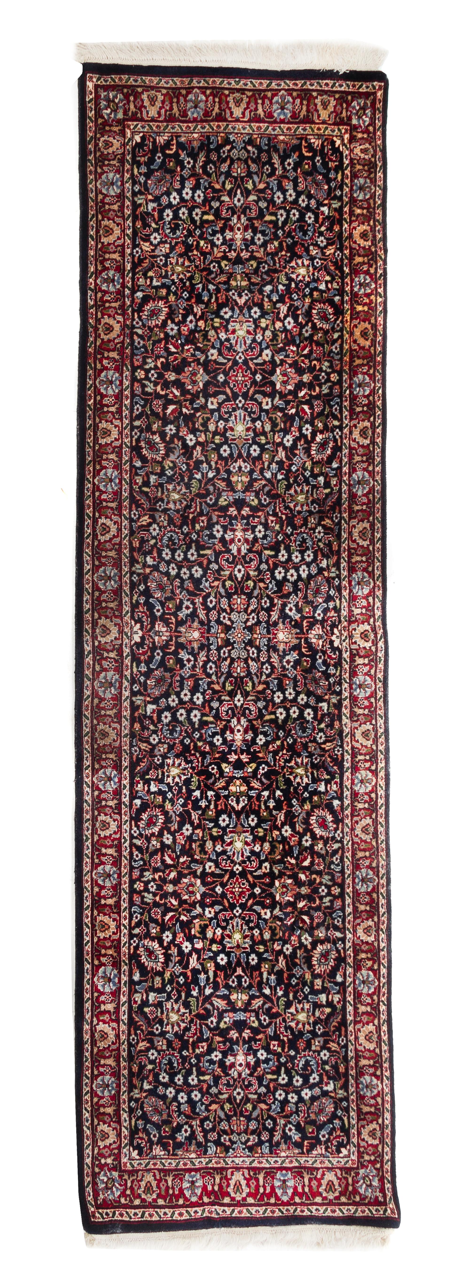 A Tabriz Wool Rug 7 feet 11 inches x 2 feet 7 inches. — SECOND HALF 20TH CENTURY
