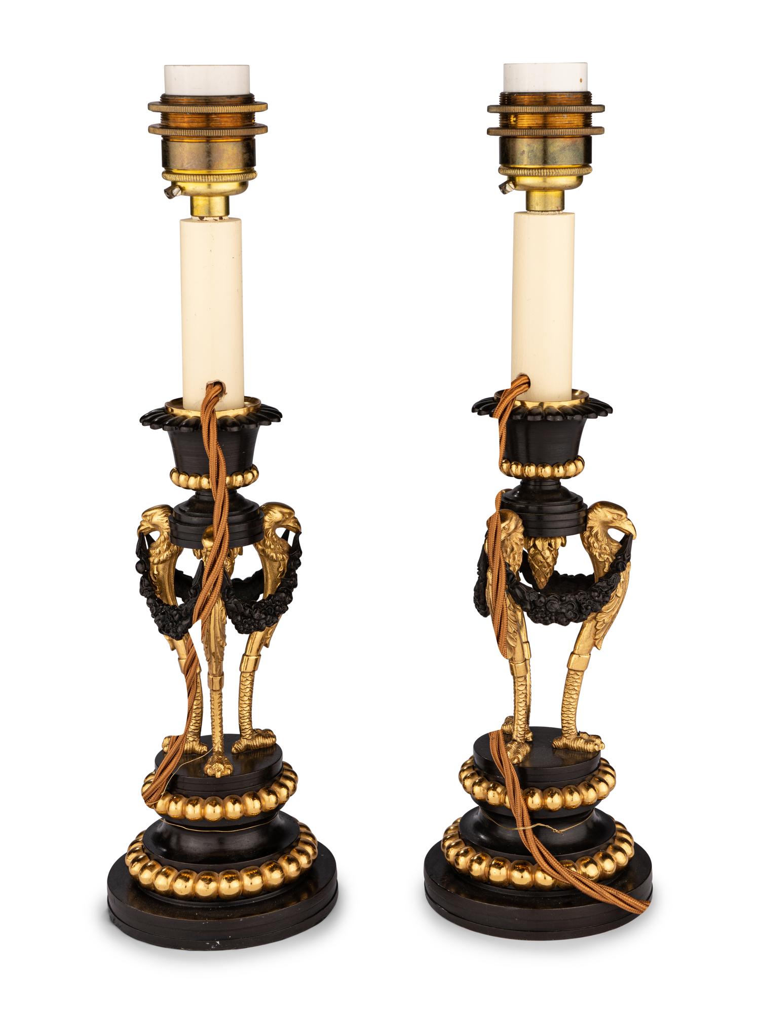 A Pair of Directoire Parcel-Gilt Bronze Candlesticks