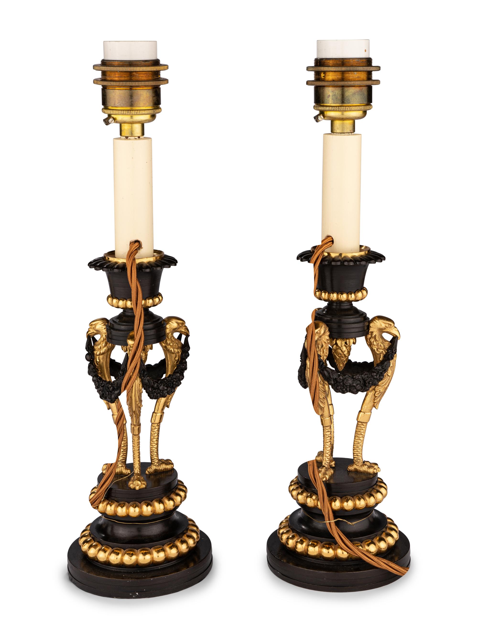 A Pair of Directoire Parcel-Gilt Bronze Candlesticks