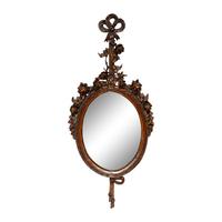 A Louis XVI Style Carved Walnut Mirror