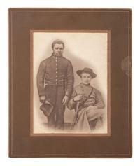 [AFRICAN AMERICANA] -- [CIVIL WAR]. Portrait of CSA Lieutenant J. Wallace Comer, 57th Alabama Infantry, with enslaved African American Burrell. Ca 1900.