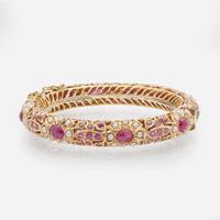 A 14K Yellow Gold, Pearl, and Ruby Bracelet