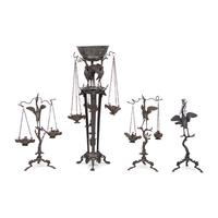 A Grand Tour Bronze Three-Piece Oil-Lamp Garniture