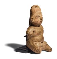 An Olmec Terracotta Seated Infant