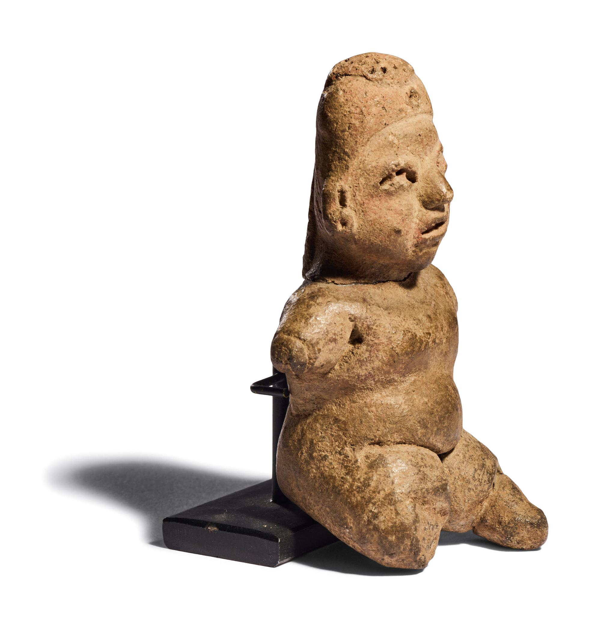 An Olmec Terracotta Seated Infant