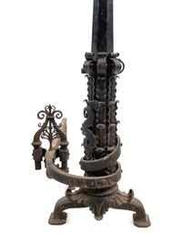 A Pair of Continental Iron Andirons