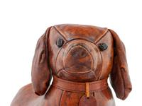 An Omersa & Co. Leather ‘Puppy’ Foot Stool