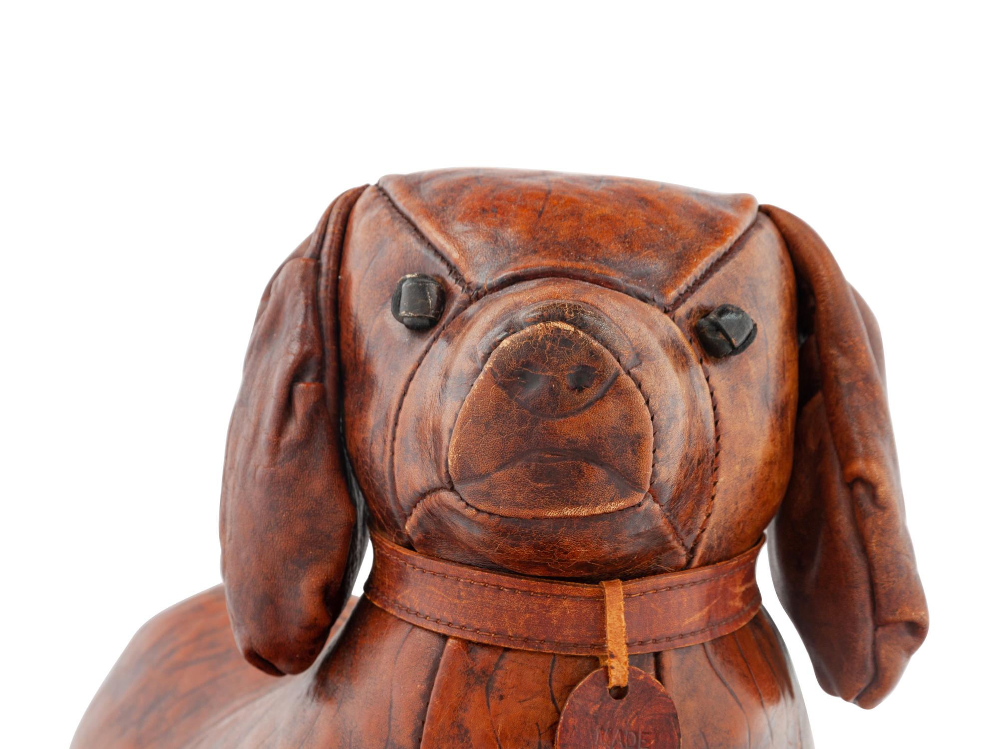 An Omersa & Co. Leather ‘Puppy’ Foot Stool