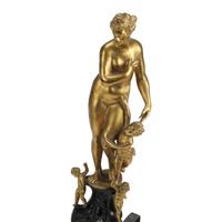 A Pair of French Gilt and Patinated Bronze Figural Chenets