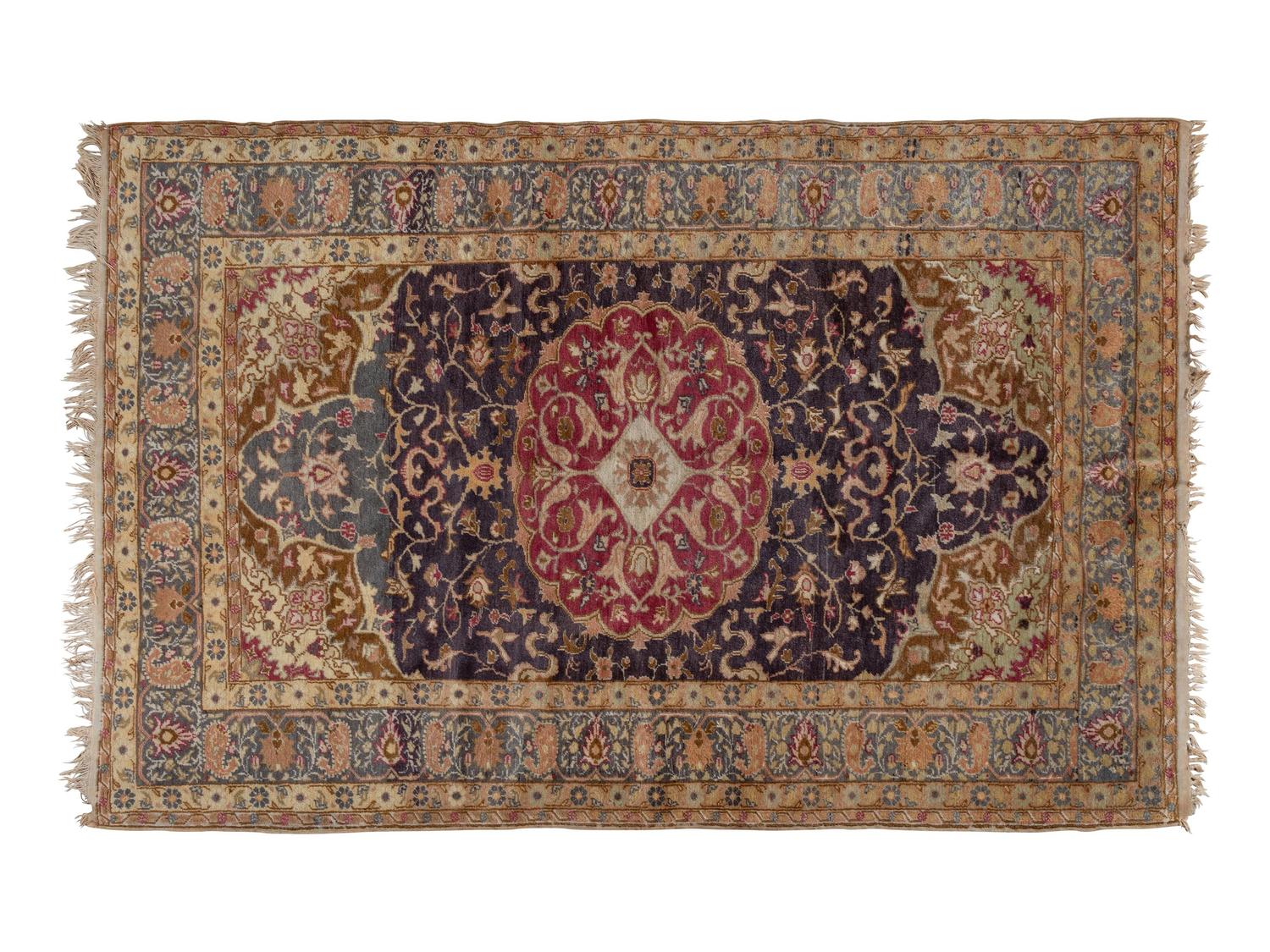 A Tabriz Wool Rug
