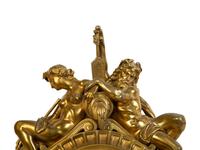 A Louis XVI Style Gilt Bronze Figural Wall Clock — 19TH CENTURY
