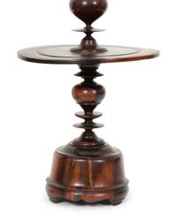 A Pair of Portuguese Colonial Jacaranda Candlesticks