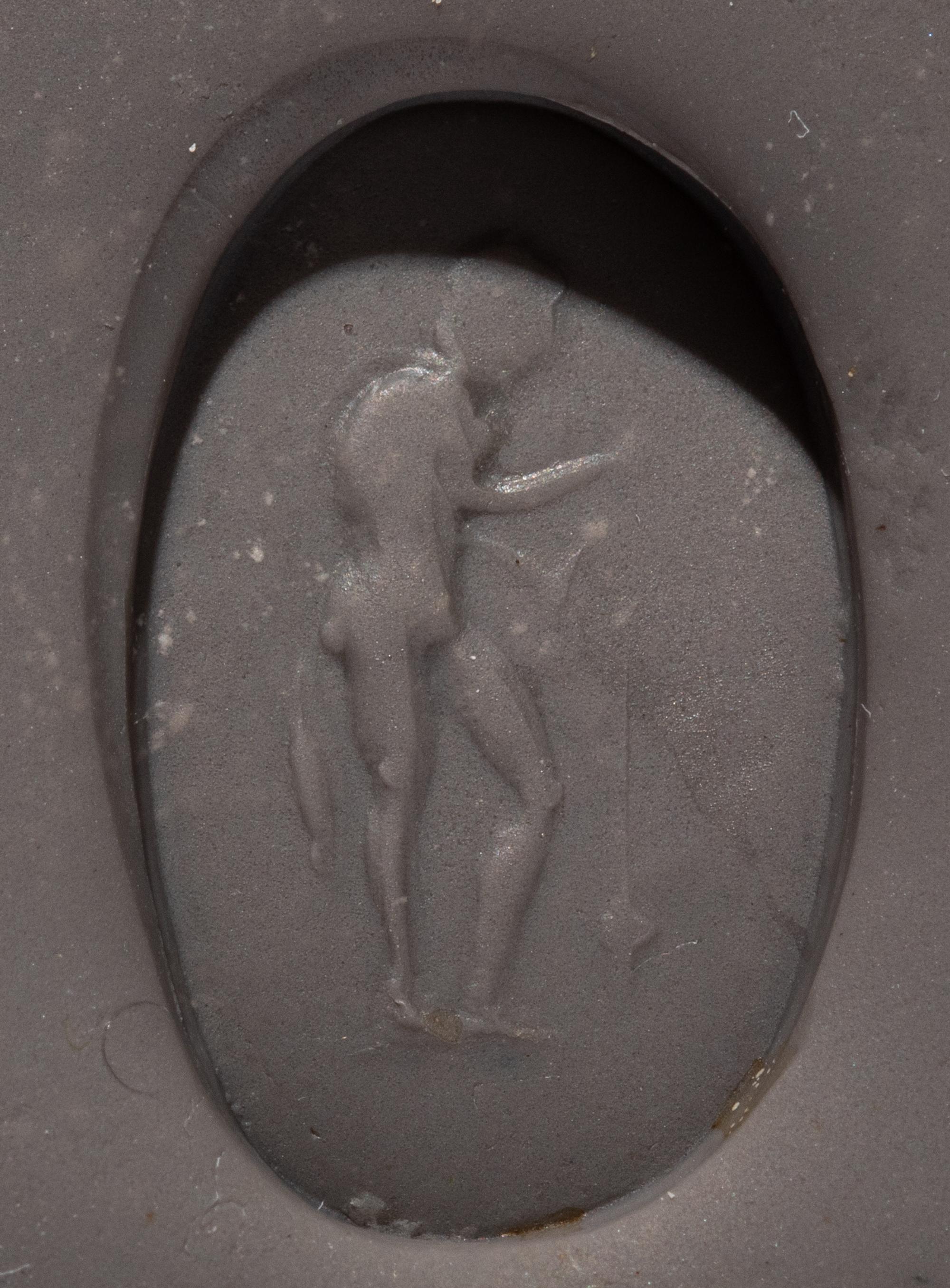 A Roman Banded Agate Ring Stone with a Fisherman and His Catch