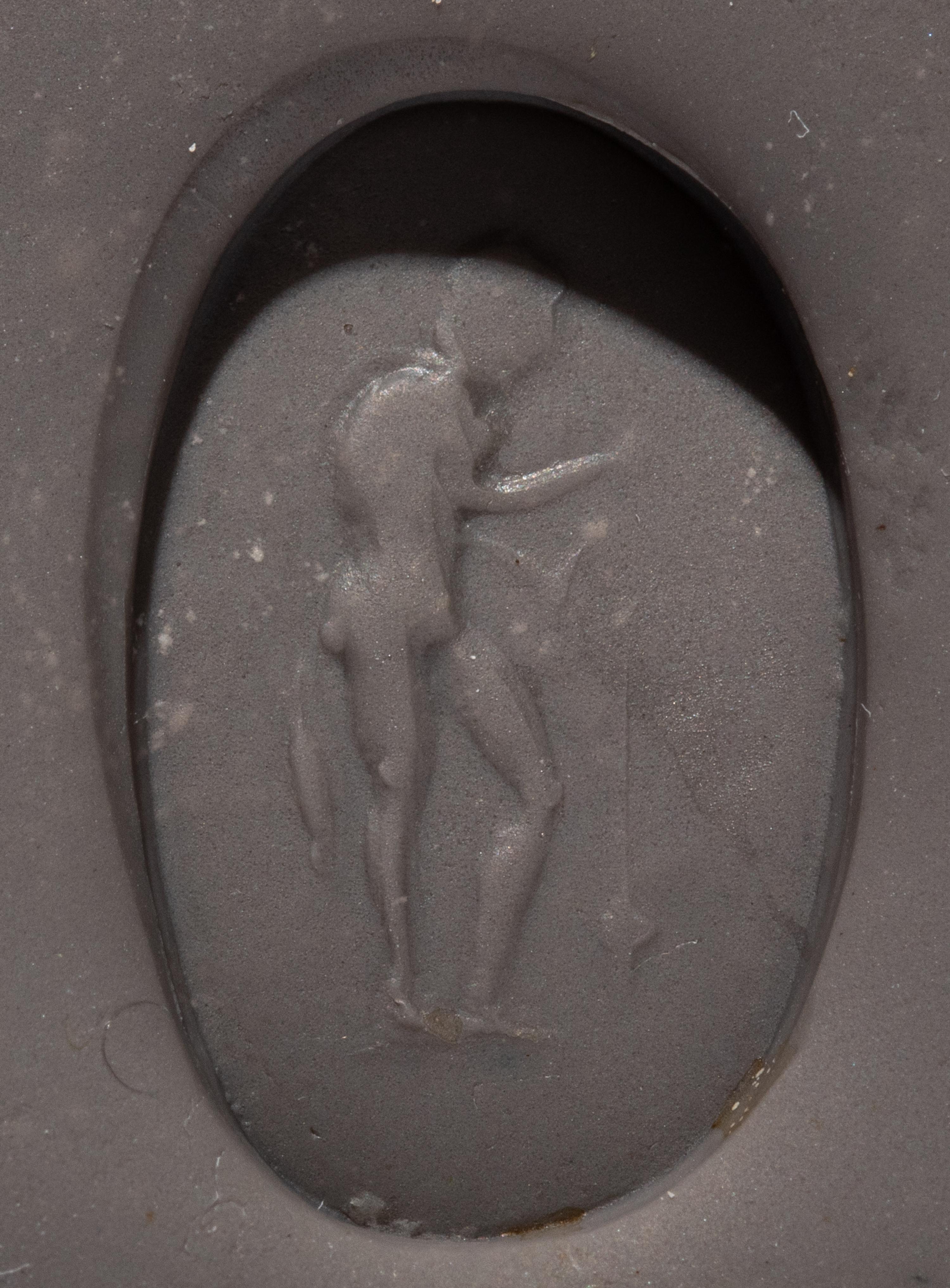 A Roman Banded Agate Ring Stone with a Fisherman and His Catch