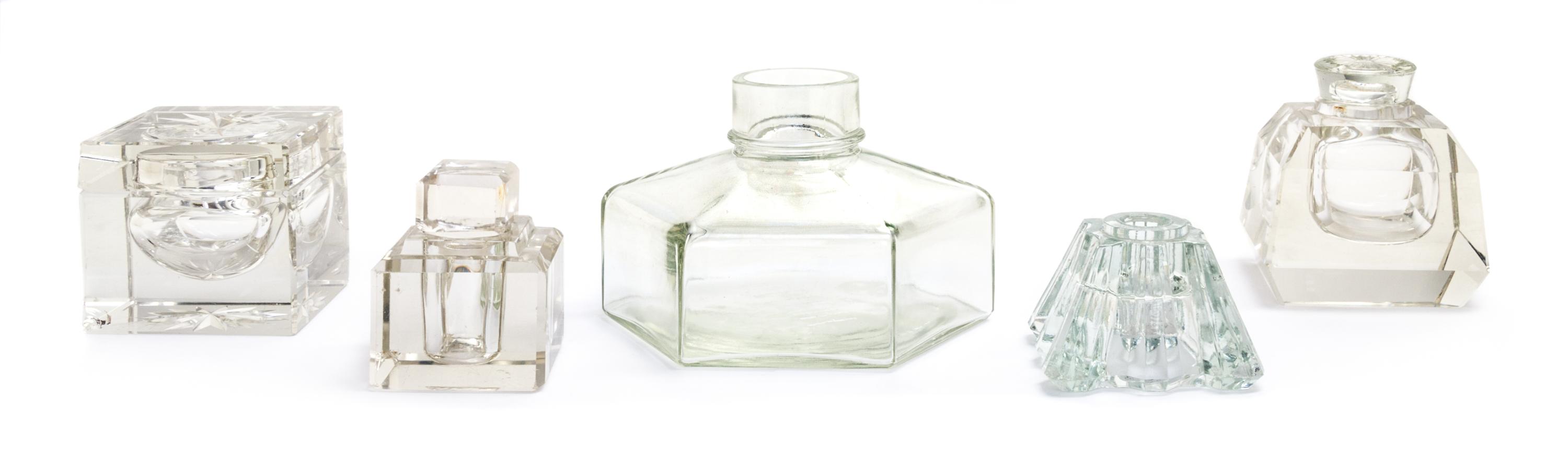 A Group of Four Glass Inkwells Height of last 5 inches.