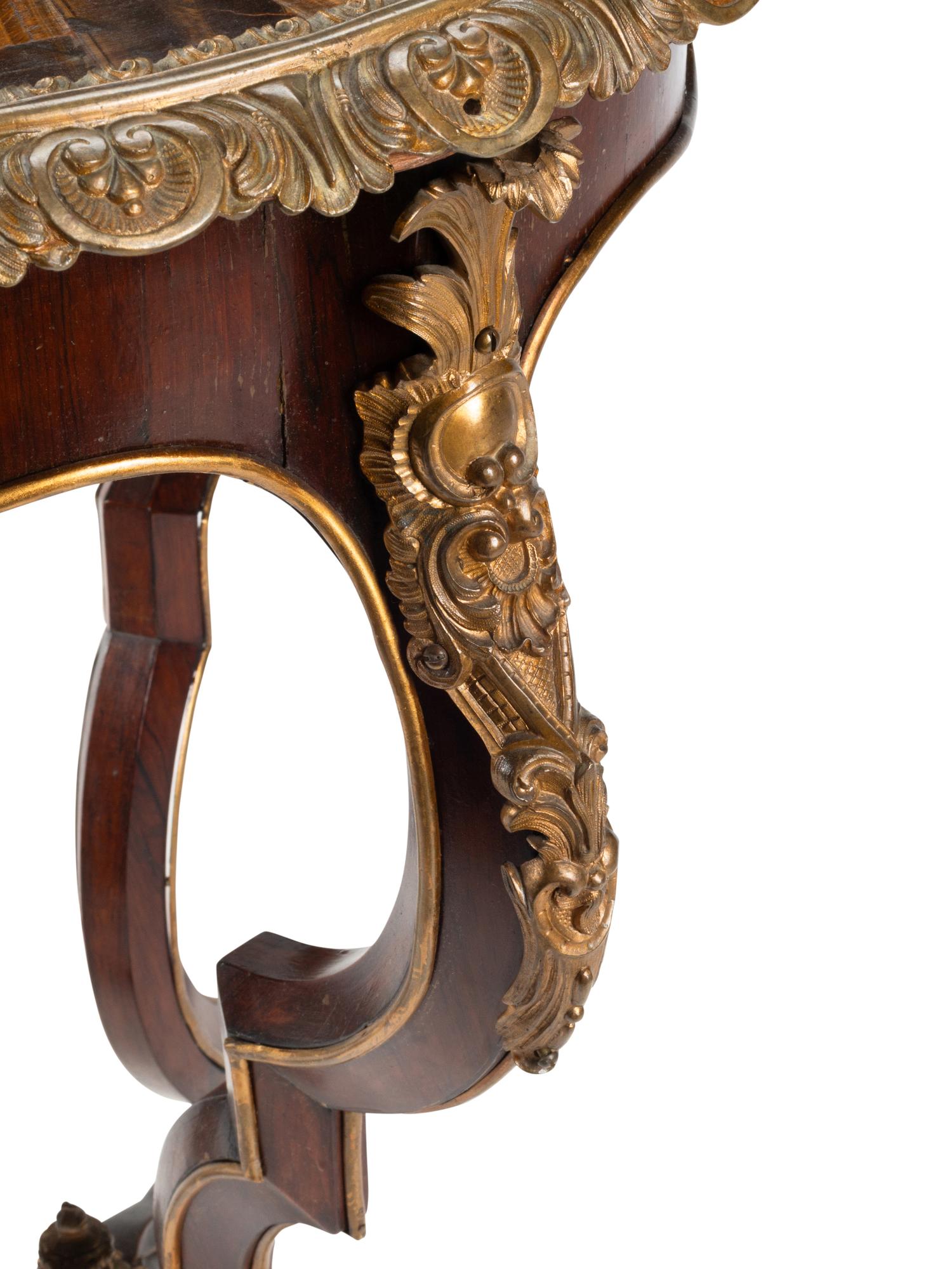 A Napoleon III Gilt Bronze and Inlaid Tiger's Eye Table