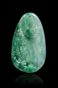 A Chinese Green Jadeite Pendant Length 1 5/8 inches. — 20TH CENTURY