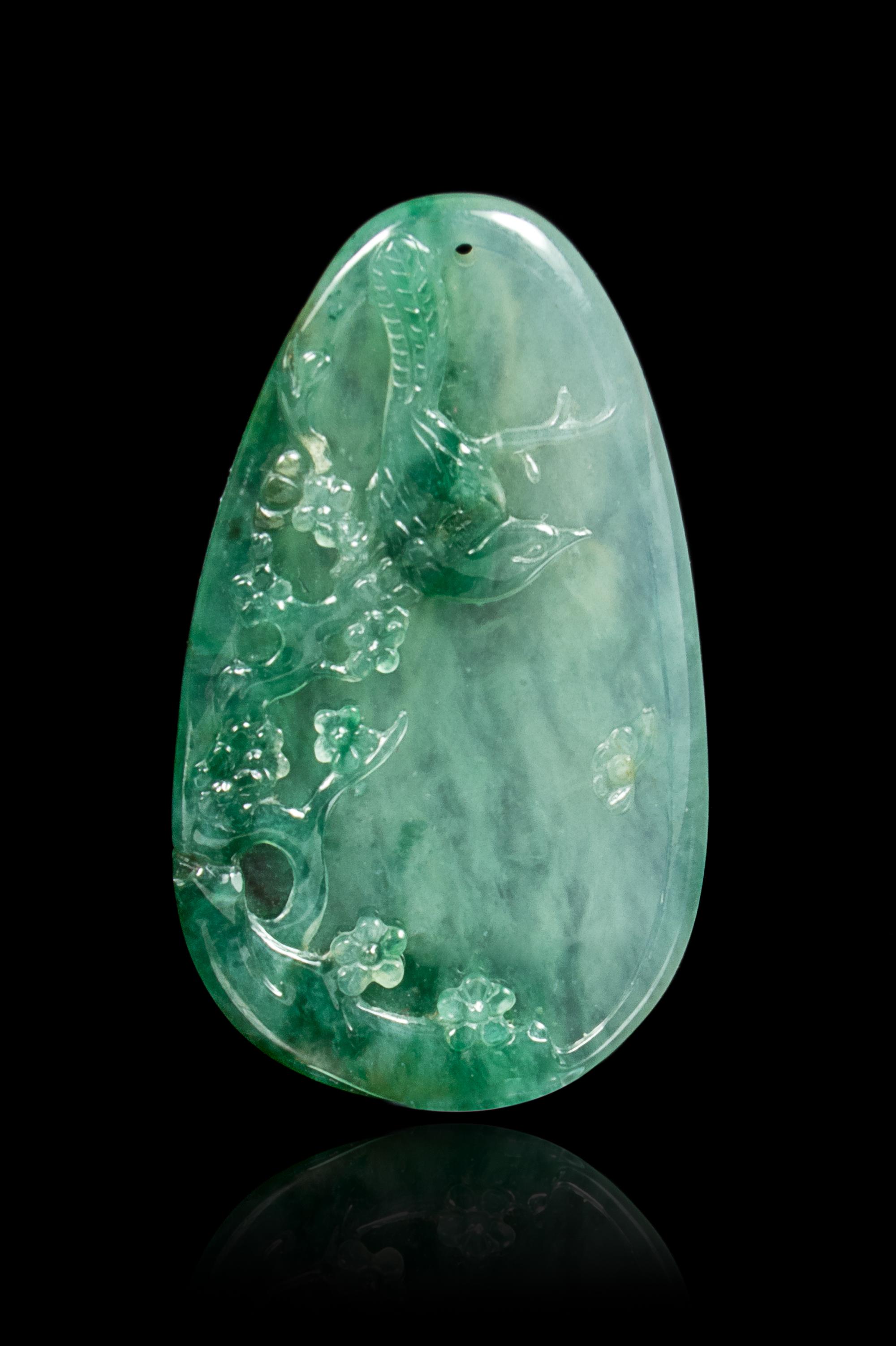 A Chinese Green Jadeite Pendant Length 1 5/8 inches. — 20TH CENTURY