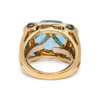 YELLOW GOLD, BLUE TOPAZ, AND DIAMOND RING
