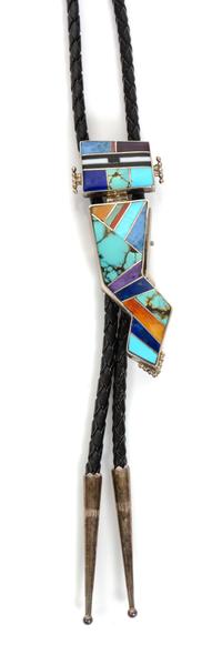 A Navajo Silver and Multiple Stone Mosaic Bolo, Yazzie Height 2 7/8 x width 1 1/8 inches.