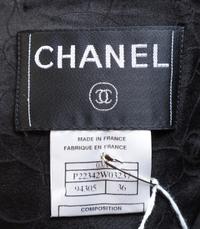 A Chanel Black Boucle Jacket Ensemble, Size 36.