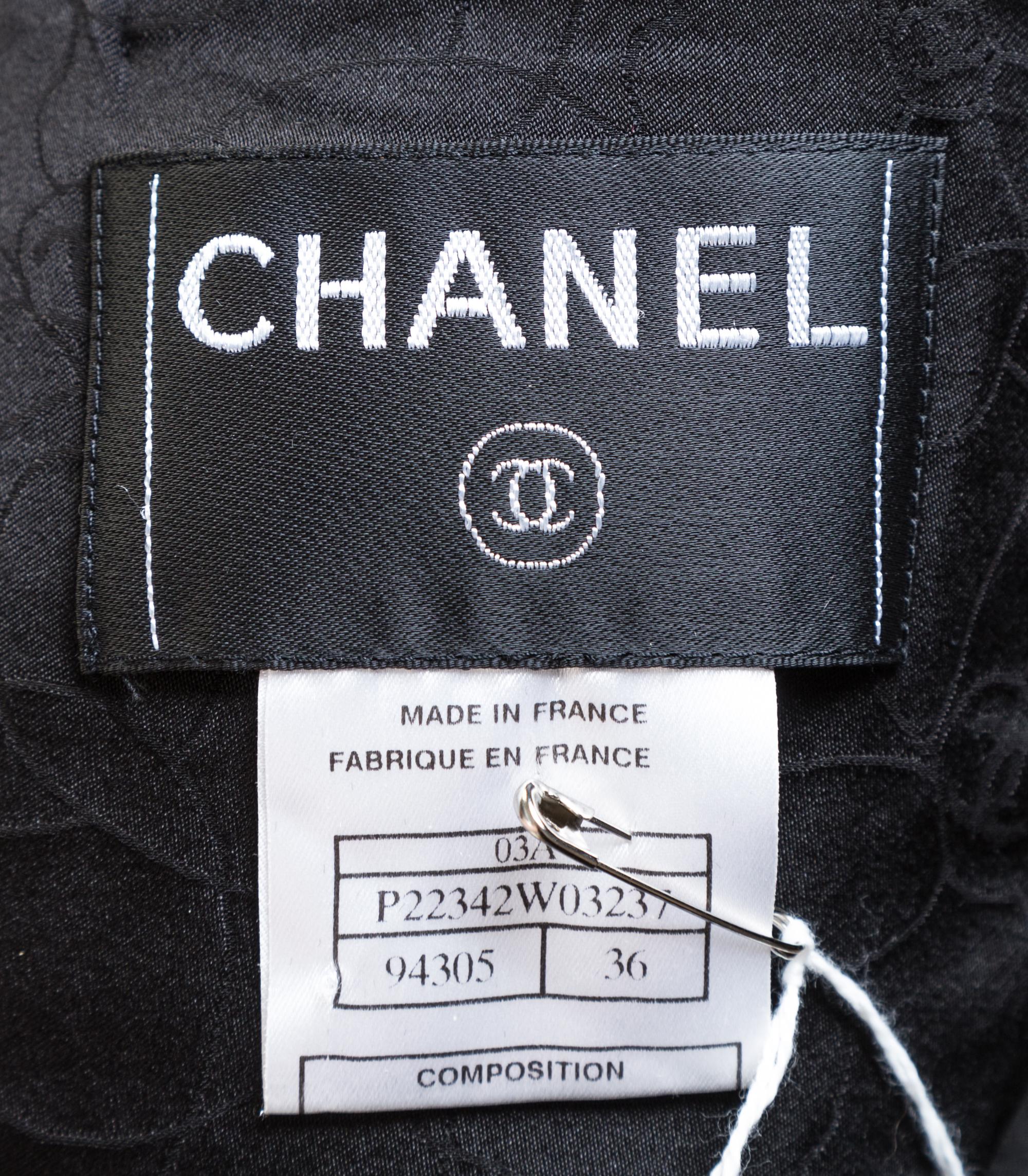A Chanel Black Boucle Jacket Ensemble, Size 36.