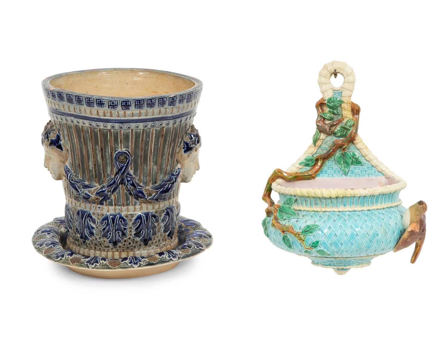 An English Majolica Jardiniere with Stand and a Cistern-form Wall Pocket
