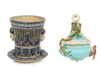 An English Majolica Jardiniere with Stand and a Cistern-form Wall Pocket